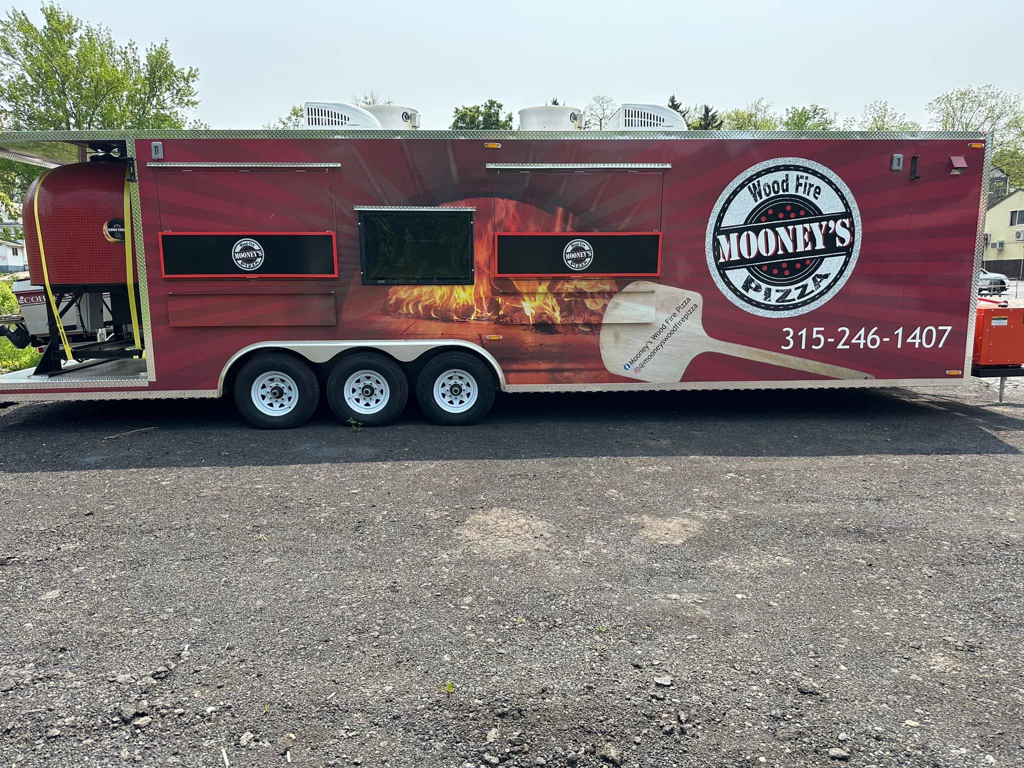 Mooney's Wood Fire Pizza trailer, side view with full brand wrap